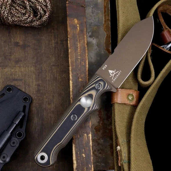 White River Firecraft 4, Firecraft 4 Midnight Bronze, FC4 Custom Shop 2026, S35VN Cerakote Messer, Black Tan G10 Griff, Com2you-biwak, Limitierte Messer 2026, Premium Survivalmesser, Bushcraft Messer Feuerstahl, White River Knives Deutschland