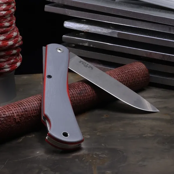 White River Mudbug Gray G10, White River Mudbug Red Liner, White River Knives Taschenmesser, Sodbuster Klappmesser G10, CPM-154 Backlock, White River Deutschland, Com2you-biwak, EDC Taschenmesser grau